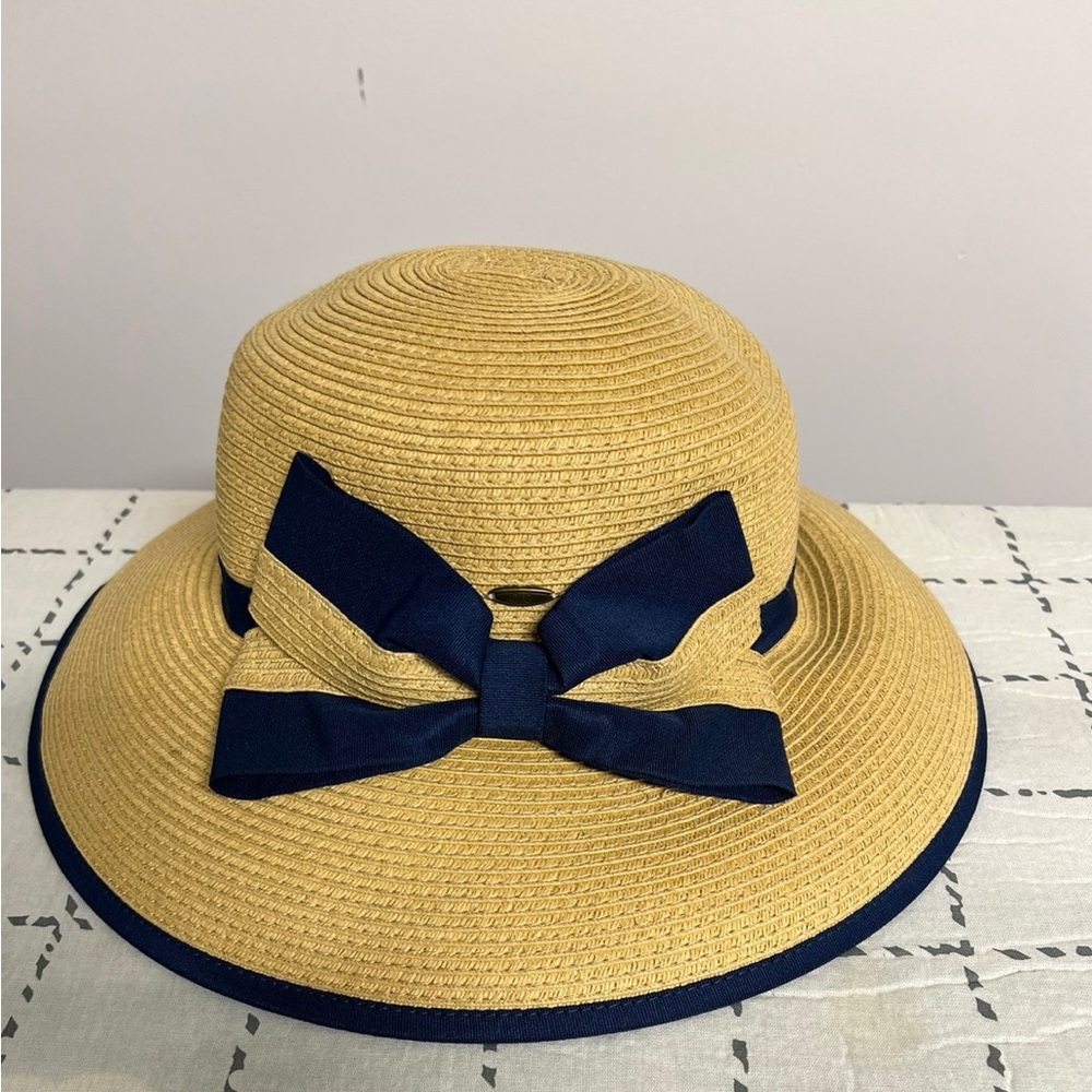 Stylish Tan Hat with Navy Bow
